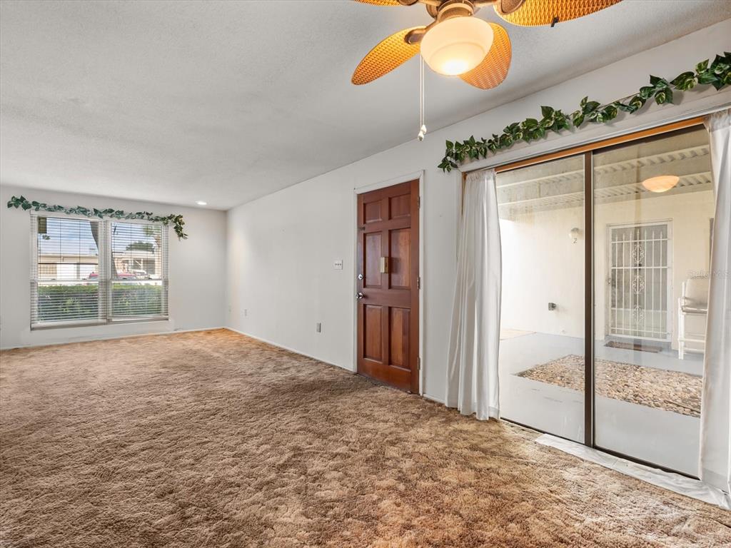 1935 South Conway Road, Unit L3 Orlando, FL 32812 - Photo 16 of 29 a view of empty room and window