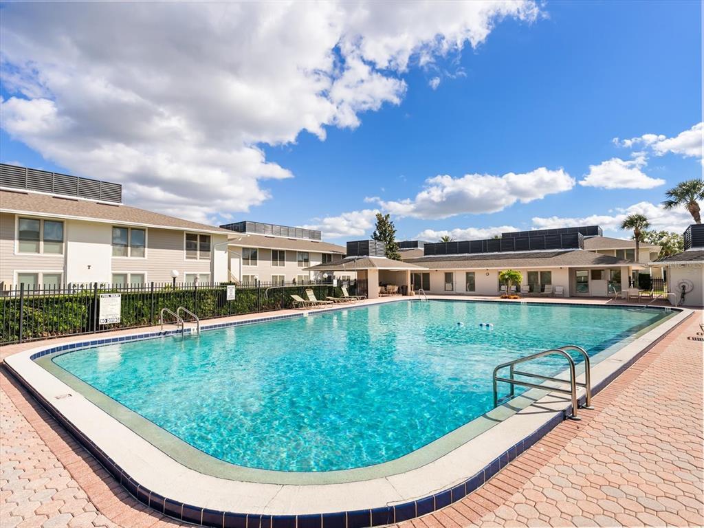 1935 South Conway Road, Unit L3 Orlando, FL 32812 - Photo 21 of 29 a view of a house with swimming pool