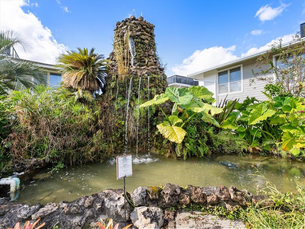 1935 South Conway Road, Unit L3 Orlando, FL 32812 - Photo 22 of 29 a view of a lake with a building in the background