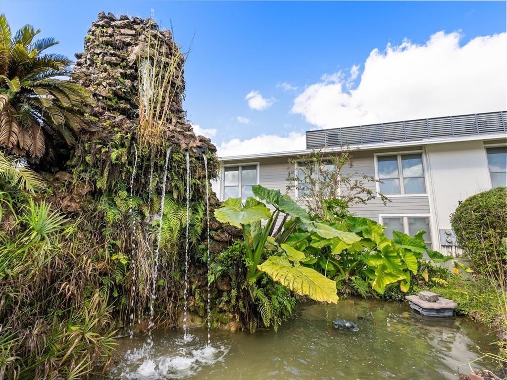 1935 South Conway Road, Unit L3 Orlando, FL 32812 - Photo 23 of 29 a view of a flower in a yard