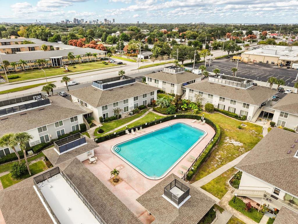 1935 South Conway Road, Unit L3 Orlando, FL 32812 - Photo 24 of 29 an aerial view of a tennis ground and a mountain view
