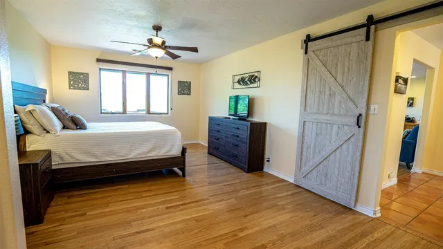 a bathroom with a sink a mirror and a window