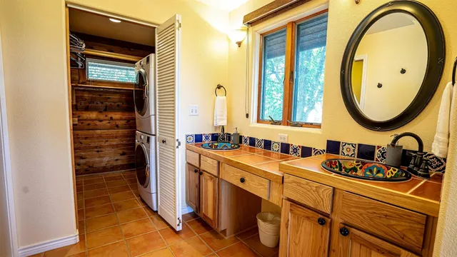 a bedroom with a bed and a table