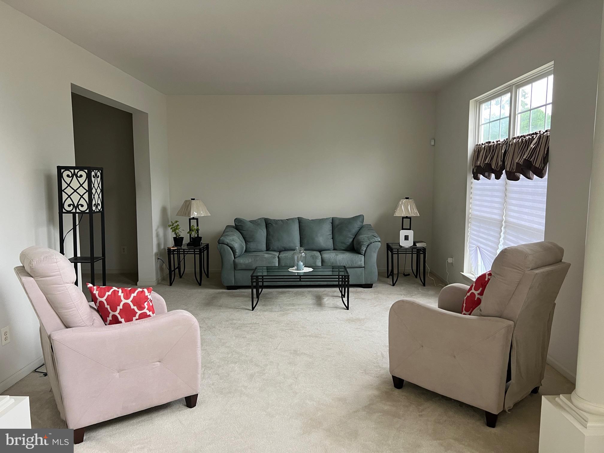 24 Brookstone Drive Sicklerville, NJ 08081 - Photo 4 of 22 a living room with furniture and a potted plant