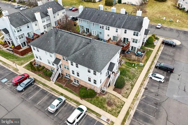 an aerial view of a house with roof