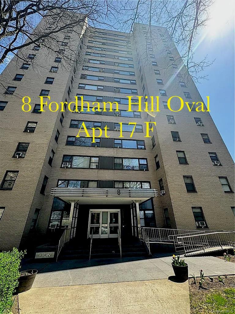8 Fordham Hill Ovl, Unit 17F Bronx, NY 10468 - Photo 1 of 1 a view of building along with street