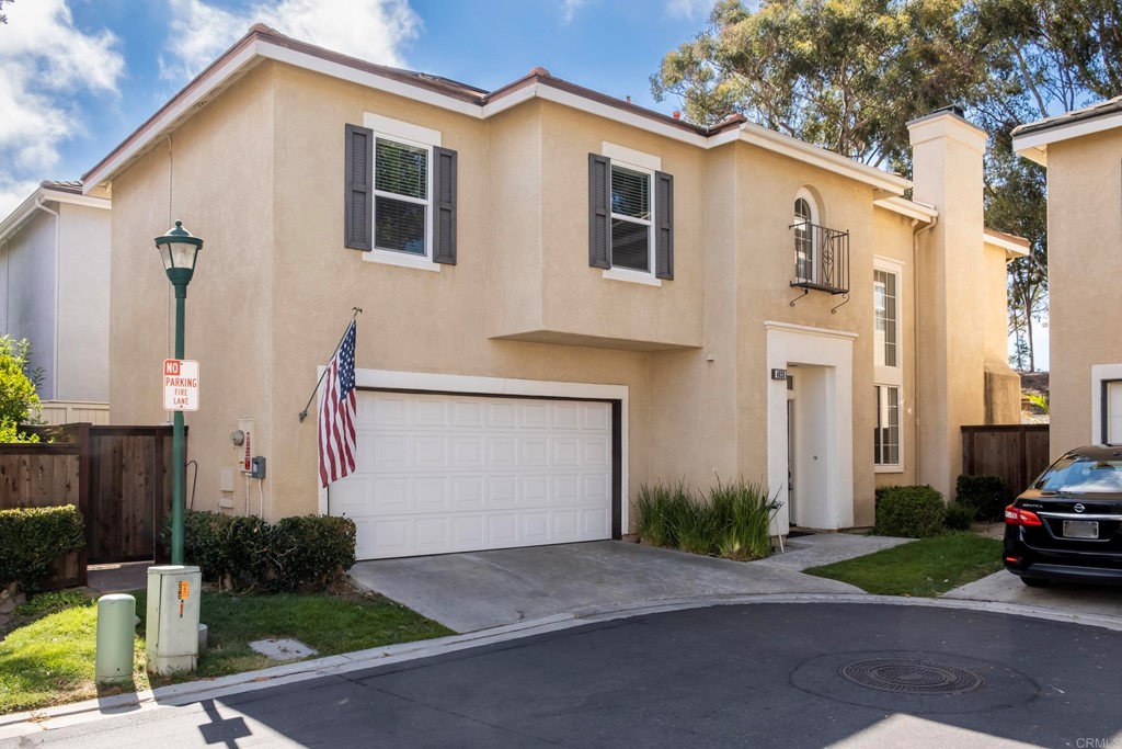 4620 Milano Way Oceanside, CA 92057 - Photo 1 of 1 a view of a house with a yard and garage