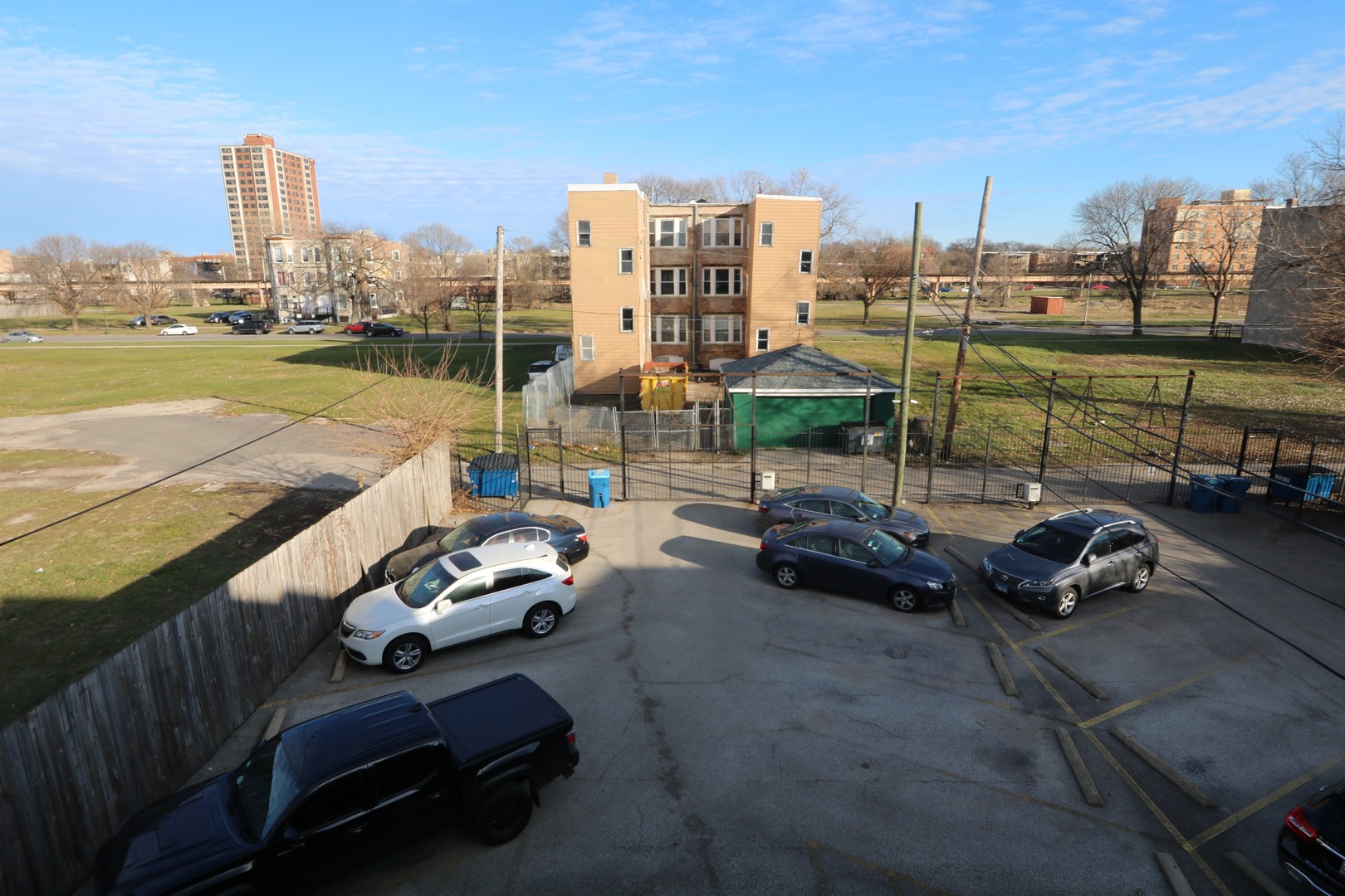 5203 South Indiana Avenue, Unit 3 Chicago, IL 60615 - Photo 14 of 15 a view of a terrace with lawn chairs and a ocean view