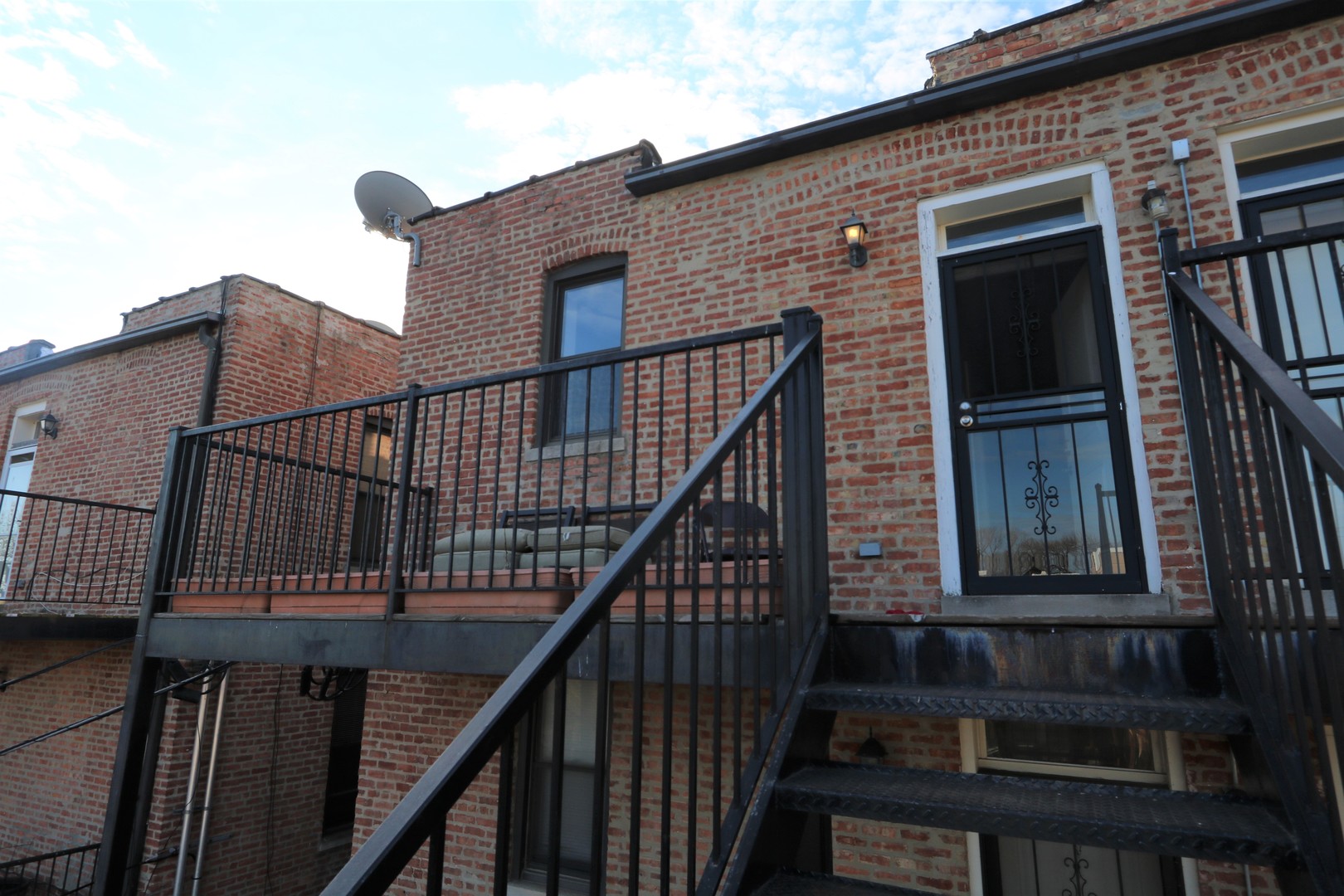 5203 South Indiana Avenue, Unit 3 Chicago, IL 60615 - Photo 15 of 15 a view of front door and deck