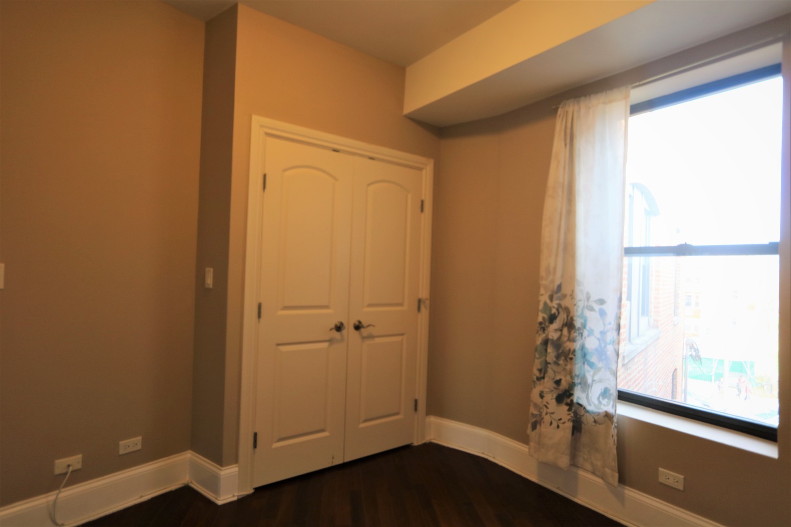 5203 South Indiana Avenue, Unit 3 Chicago, IL 60615 - Photo 7 of 15 a view of an empty room with a window