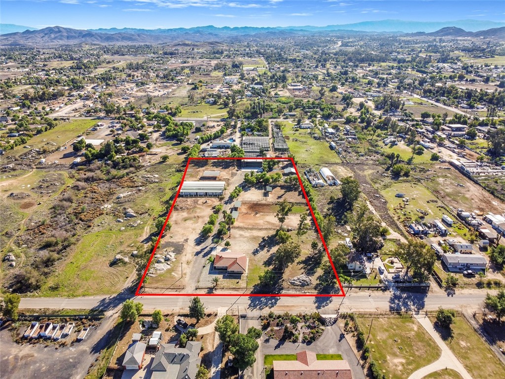 22721 Lopez Street Perris, CA 92570 - Photo 1 of 1 an aerial view of residential houses with outdoor space