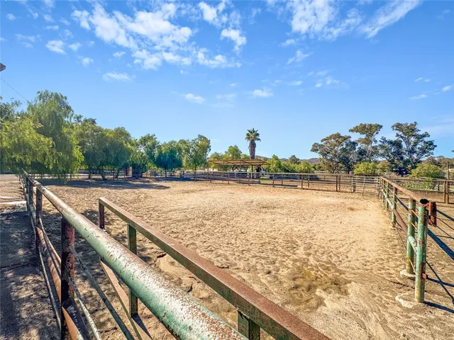 a view of swimming pool with outdoor seating