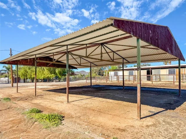 a view of a yard with an umbrella
