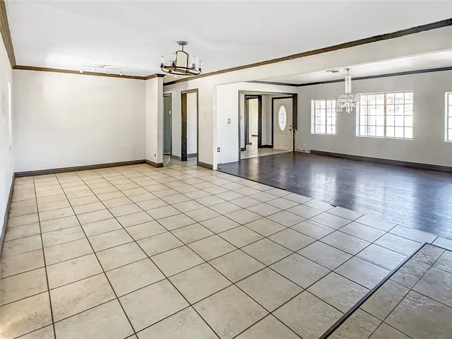 a view of a livingroom with wooden floor