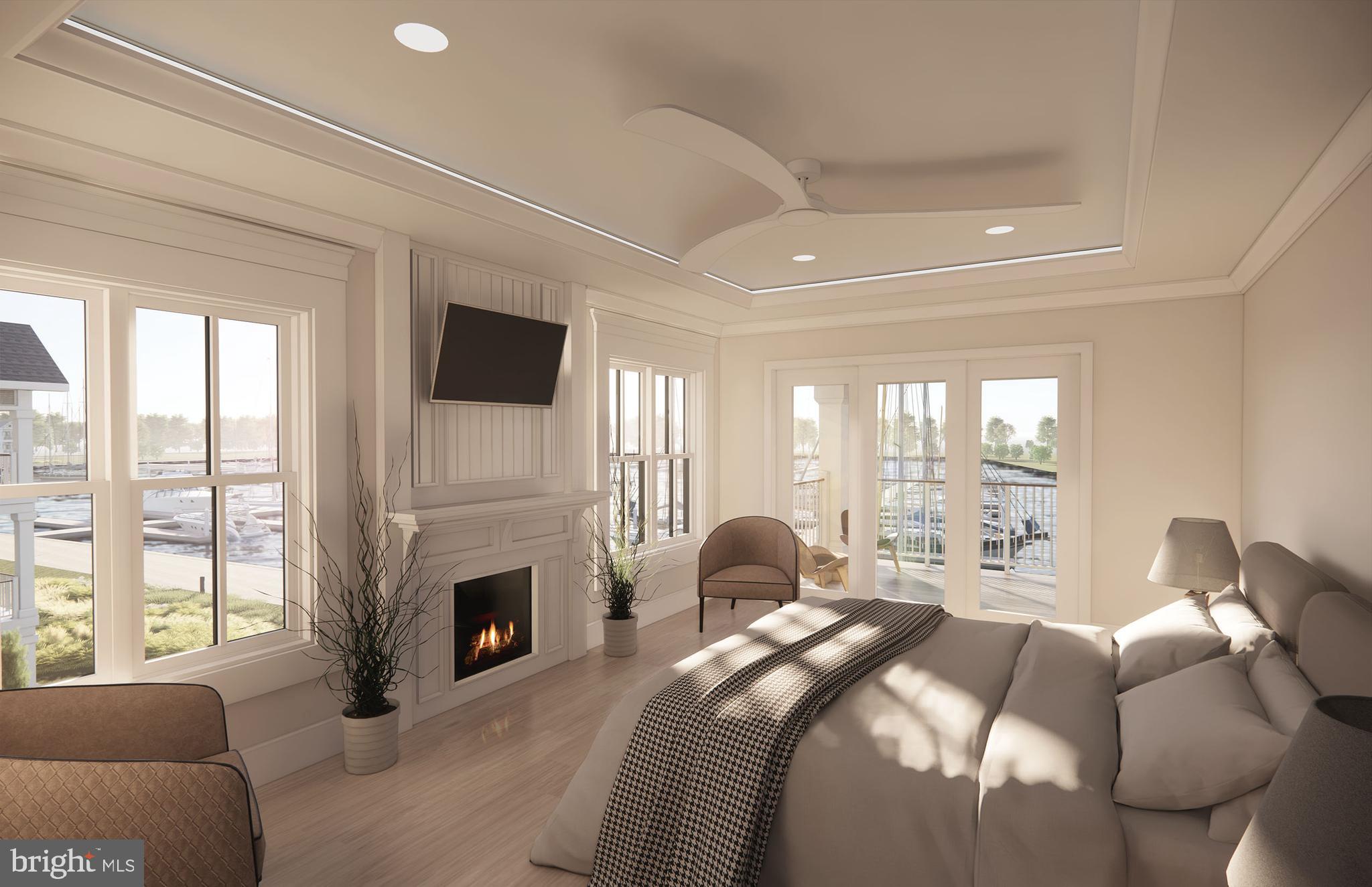 Sunset Wharf Stevensville, MD 21666 - Photo 5 of 16 Primary bedroom with covered balcony and fireplace