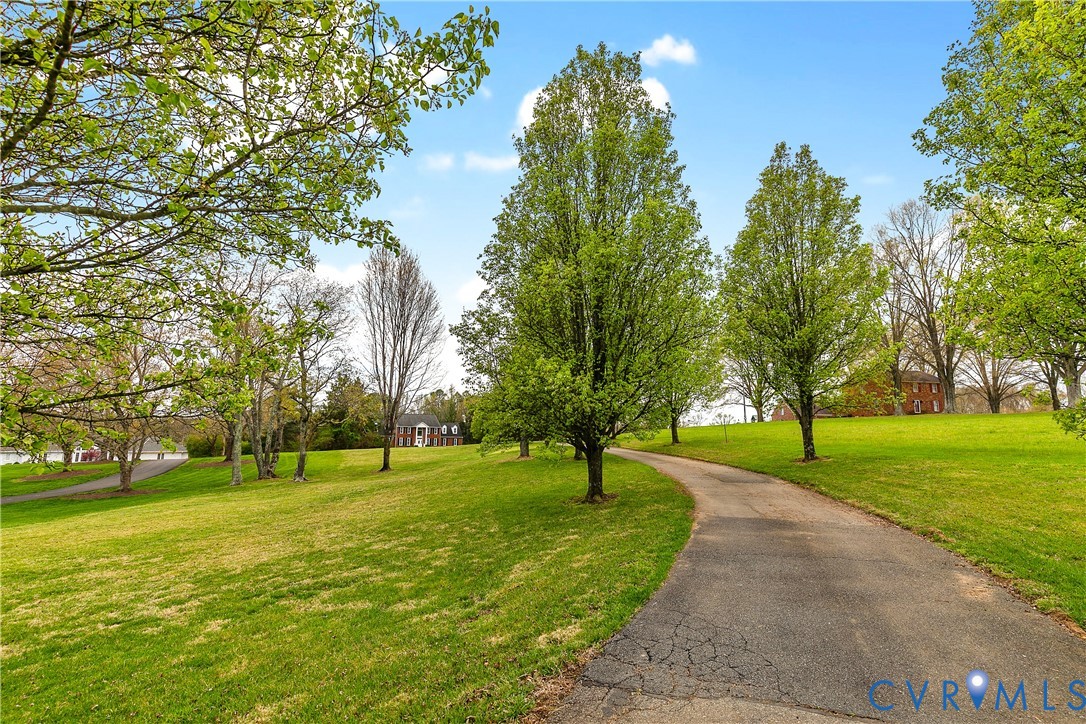 2130 Manakin Road Manakin-Sabot, VA 23103 - Photo 2 of 65 Set back on a 2 acre lot, enjoy a tree-lined drive