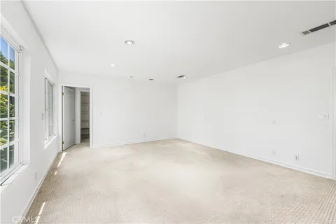 an empty room with a natural light