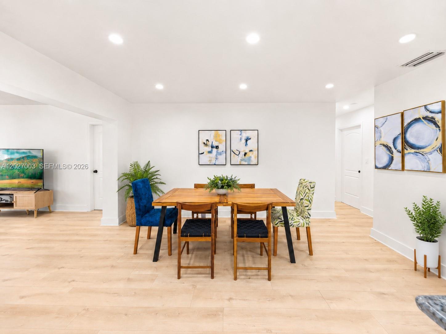 2761 Southwest 92nd Place Miami, FL 33165 - Photo 8 of 37 a view of a dining room with furniture