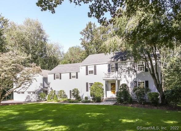 48 Topfield Road Wilton, CT 06897 - Photo 1 of 1 a front view of house with yard and green space