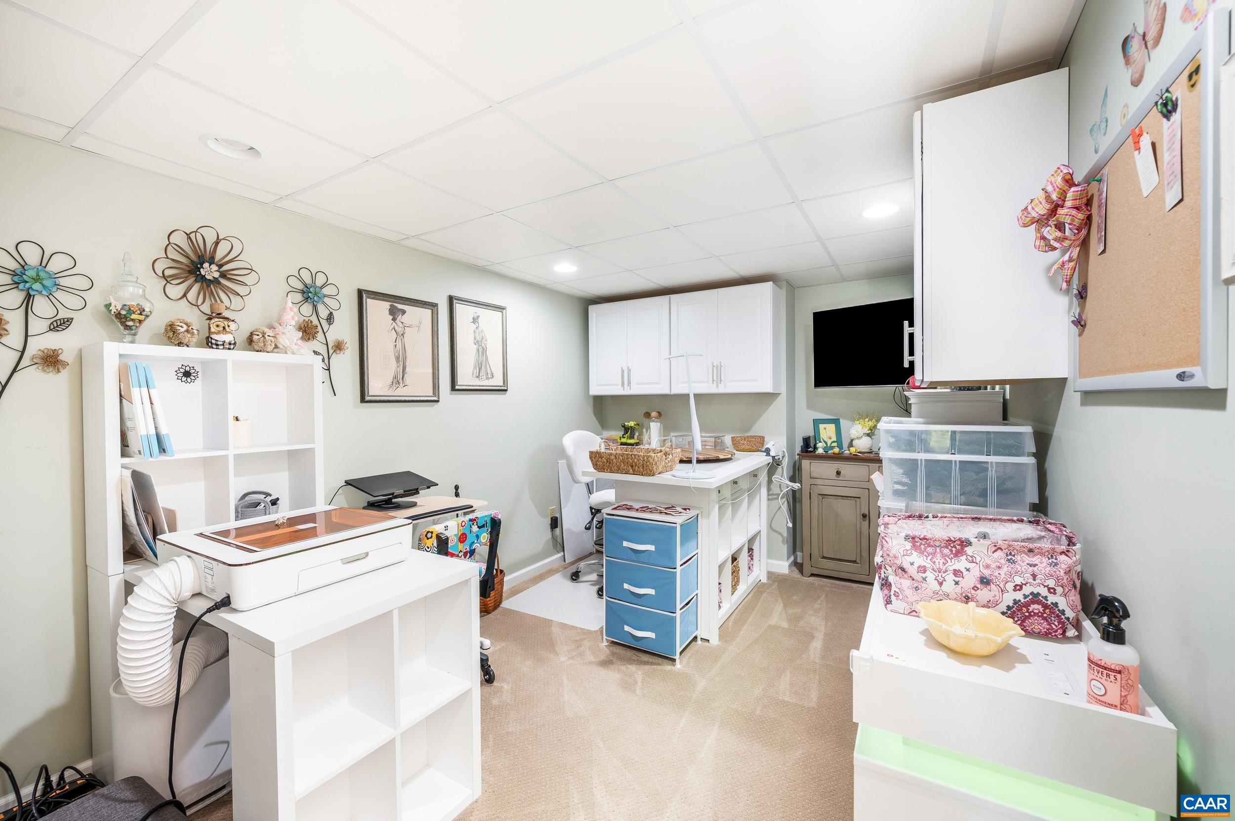 873 Copper Mine Road Dillwyn, VA 23936 - Photo 21 of 49 a living room with furniture and a flat screen tv