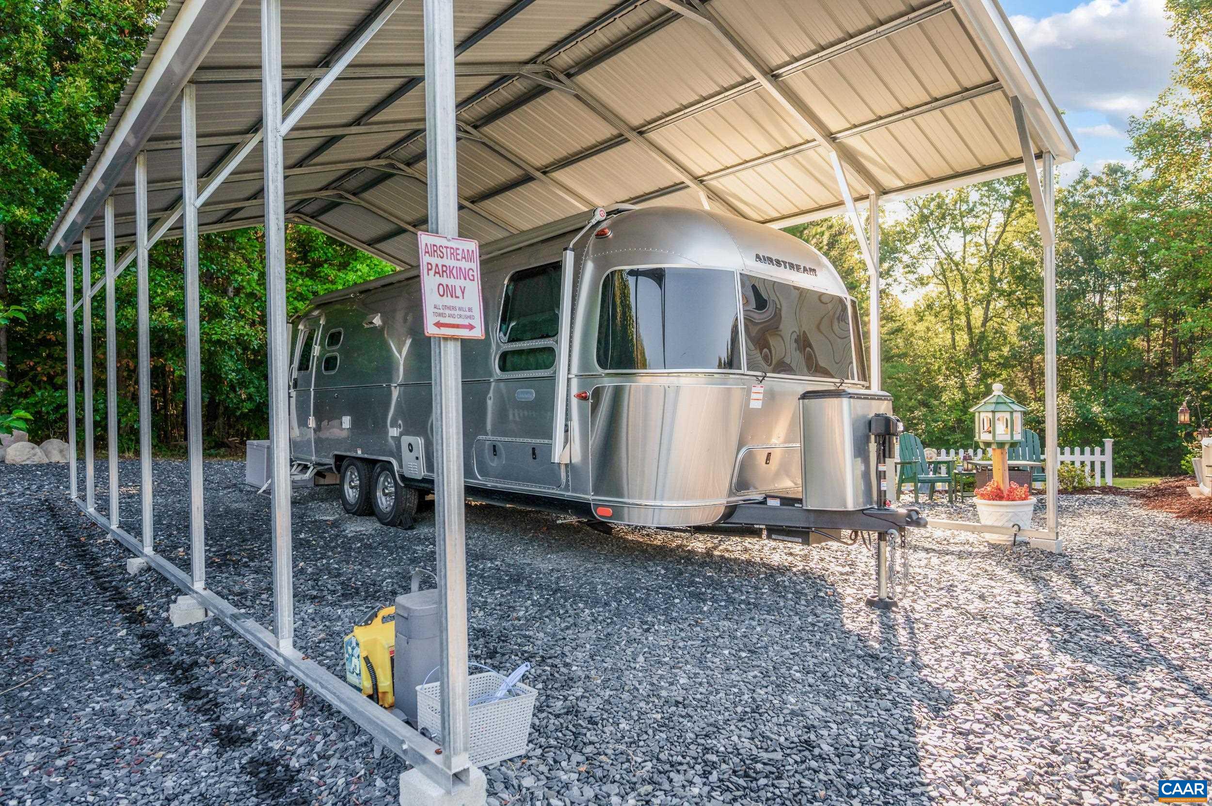 873 Copper Mine Road Dillwyn, VA 23936 - Photo 33 of 49 a view of a house with backyard sitting area and tub