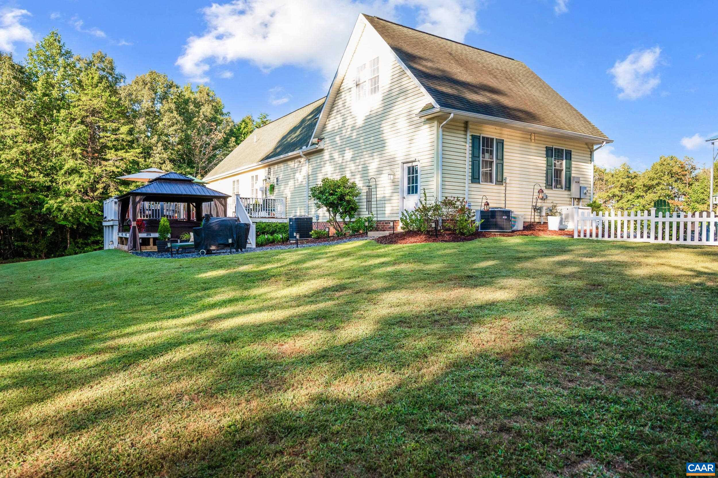 873 Copper Mine Road Dillwyn, VA 23936 - Photo 36 of 49 a front view of a house with a yard