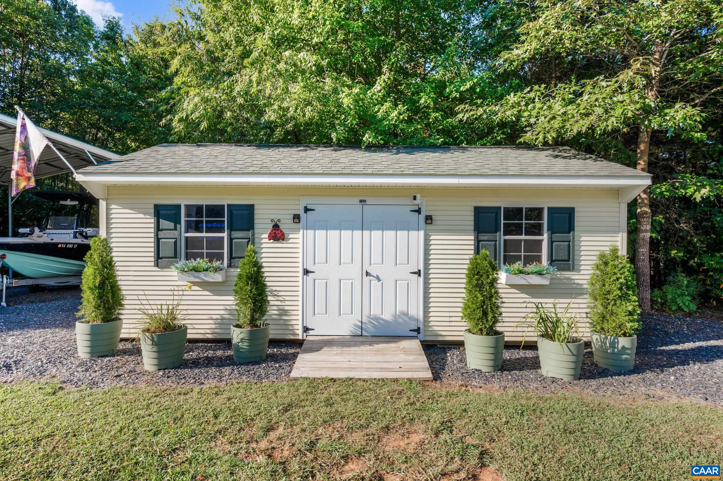 873 Copper Mine Road Dillwyn, VA 23936 - Photo 38 of 49 a front view of a house with a garden