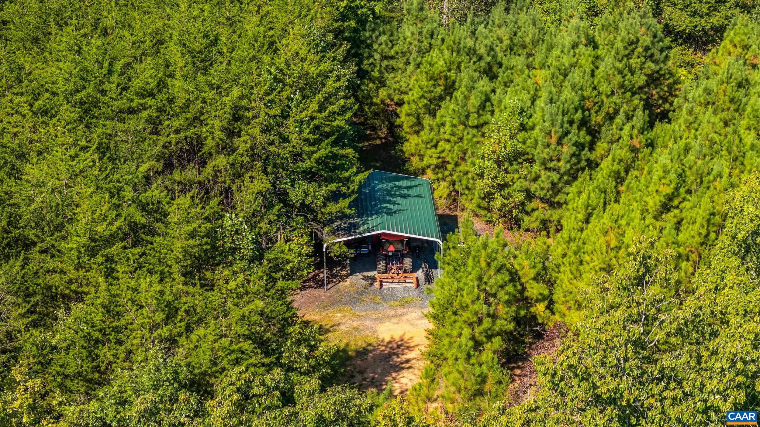 873 Copper Mine Road Dillwyn, VA 23936 - Photo 46 of 49 a view of a garden from a bench