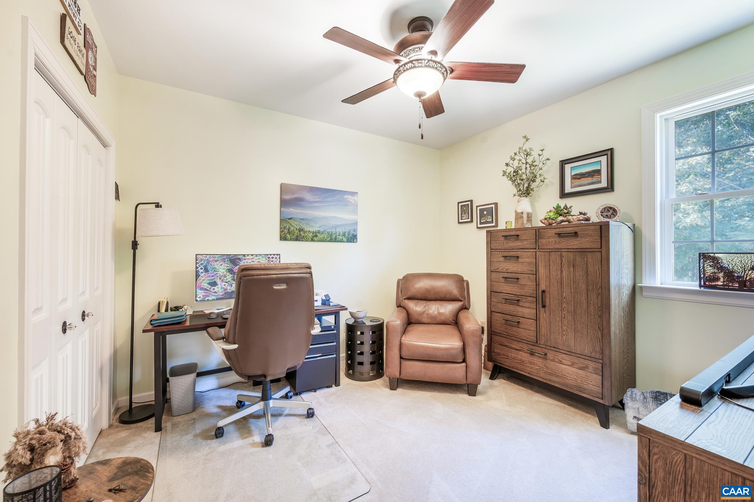 873 Copper Mine Road Dillwyn, VA 23936 - Photo 7 of 49 a view of a workspace with furniture and a window