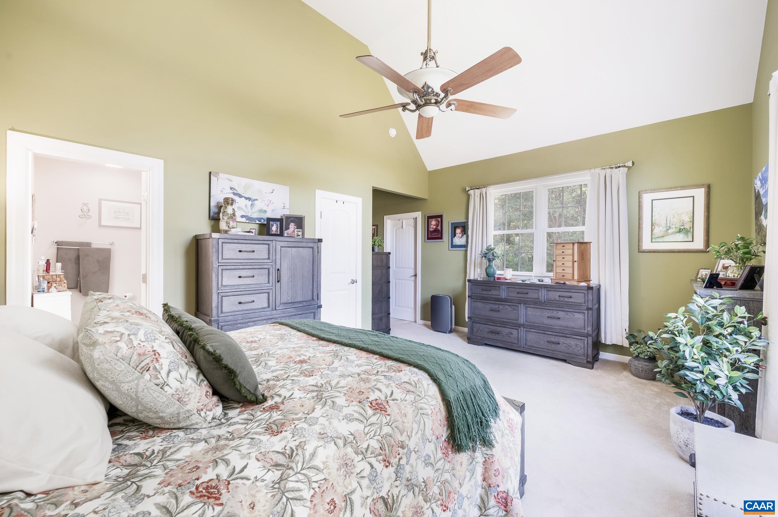 873 Copper Mine Road Dillwyn, VA 23936 - Photo 10 of 49 a bedroom with a large bed and dresser