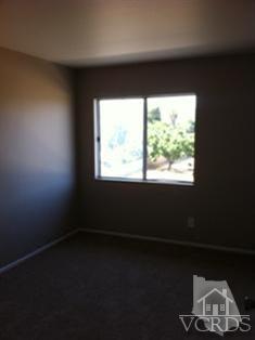 4506 Apricot Road, Unit B Simi Valley, CA 93063 - Photo 7 of 13 an empty room with a window