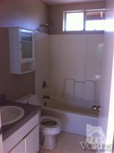 4506 Apricot Road, Unit B Simi Valley, CA 93063 - Photo 10 of 13 a bathroom with a sink a toilet and tub