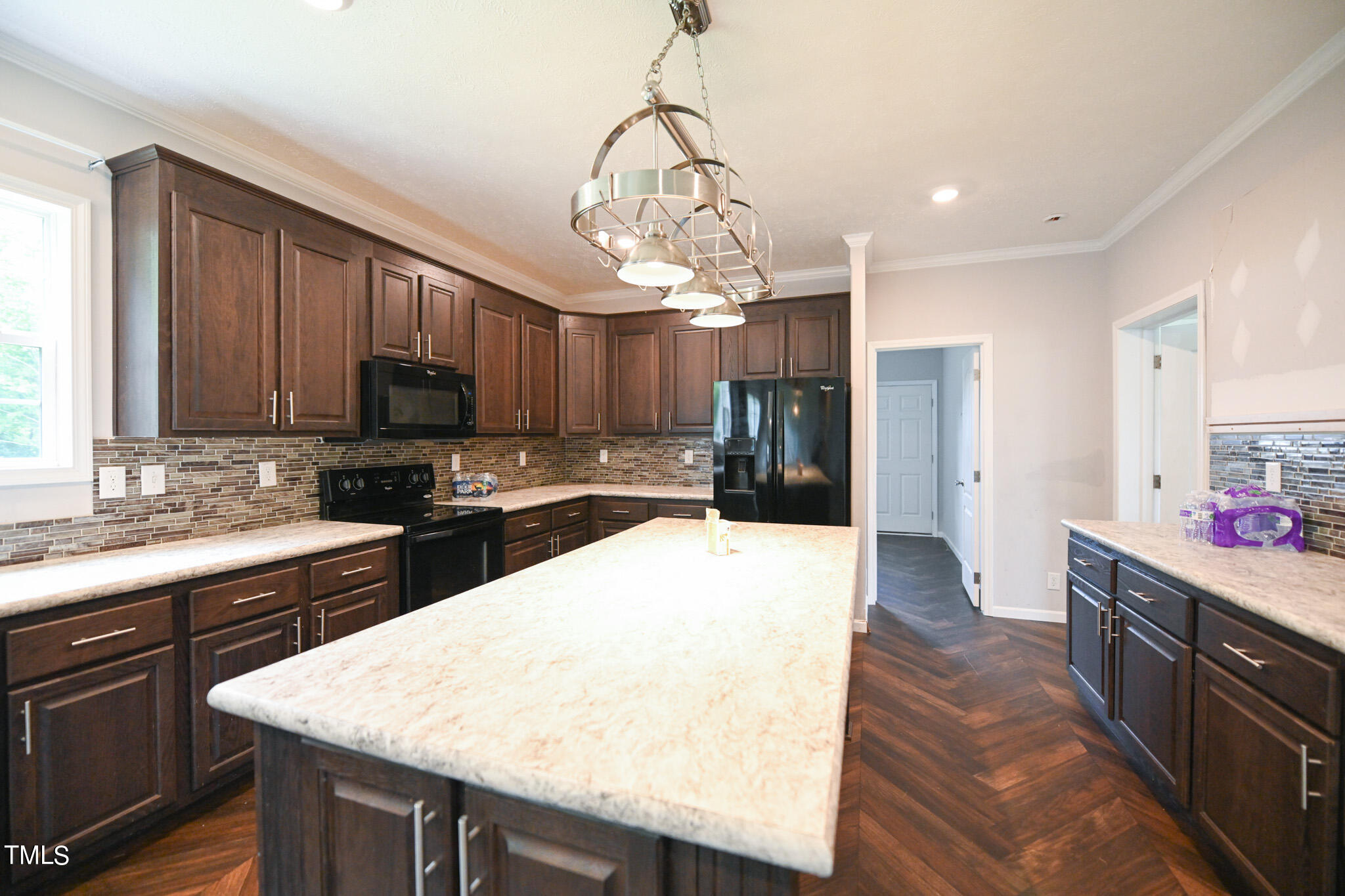 124 Evans Road Princeton, NC 27569 - Photo 16 of 44 a kitchen with stainless steel appliances granite countertop a sink stove and refrigerator