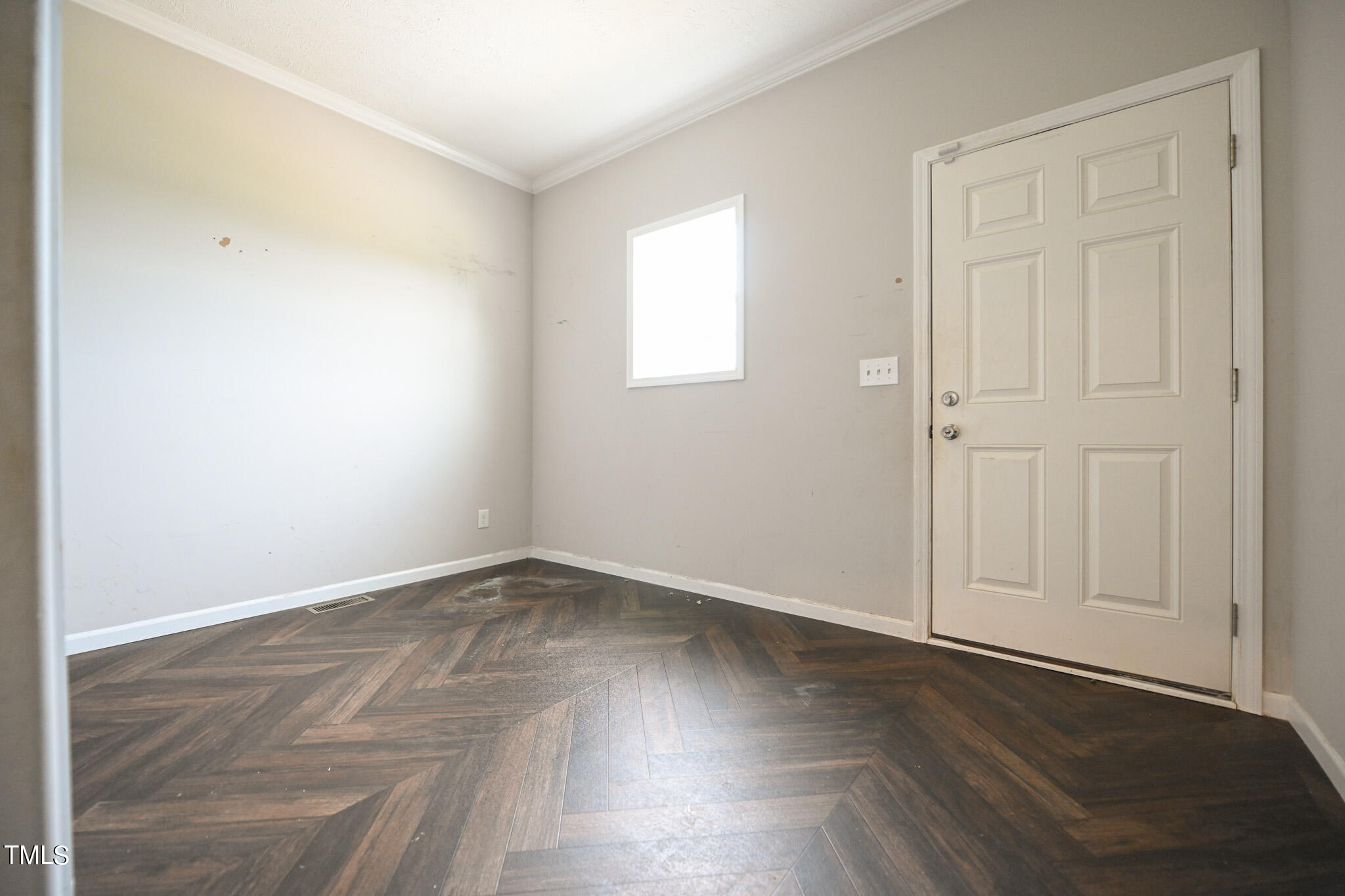 124 Evans Road Princeton, NC 27569 - Photo 18 of 44 an empty room with wooden floor & closet area