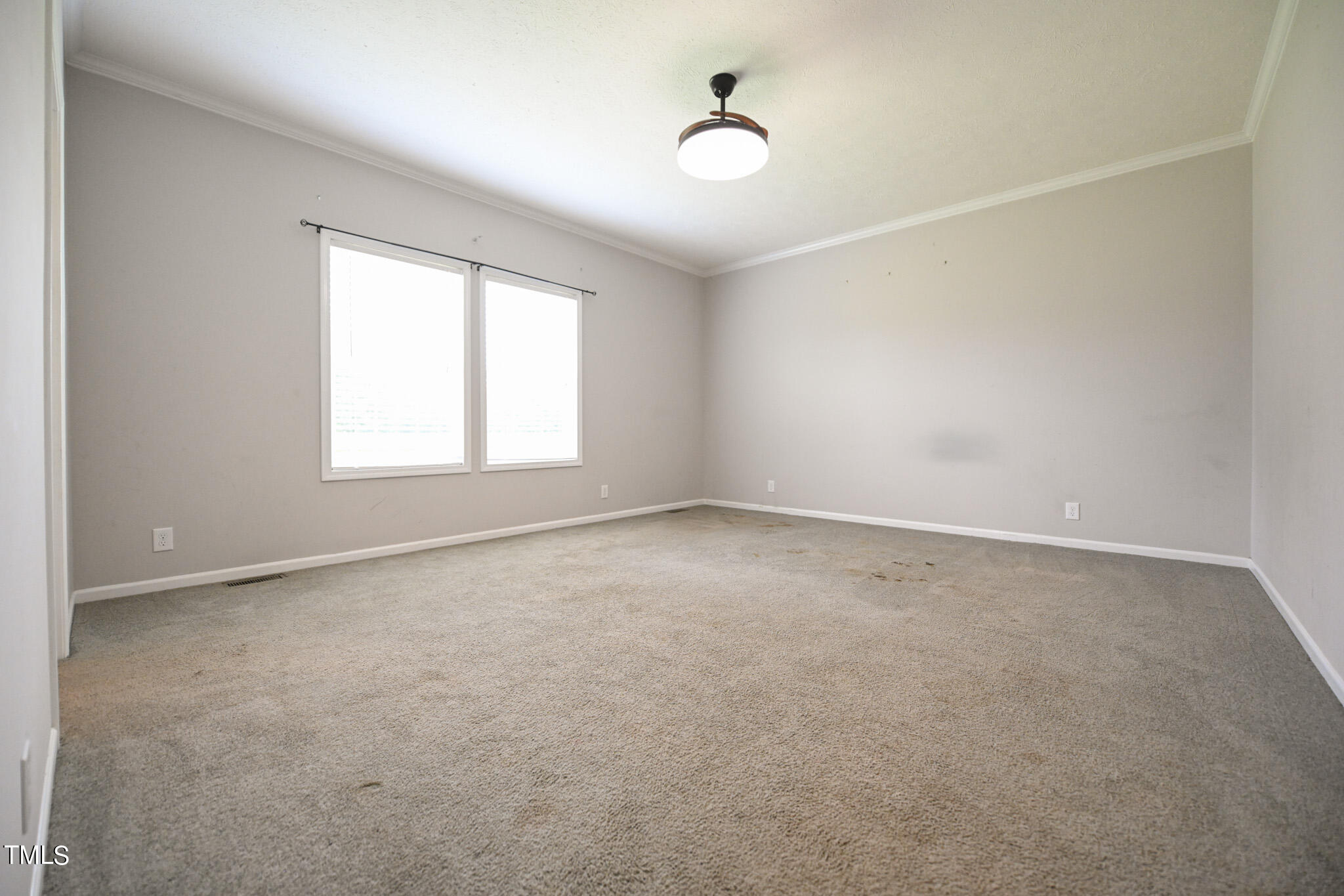 124 Evans Road Princeton, NC 27569 - Photo 20 of 44 wooden floor in an empty room with a window