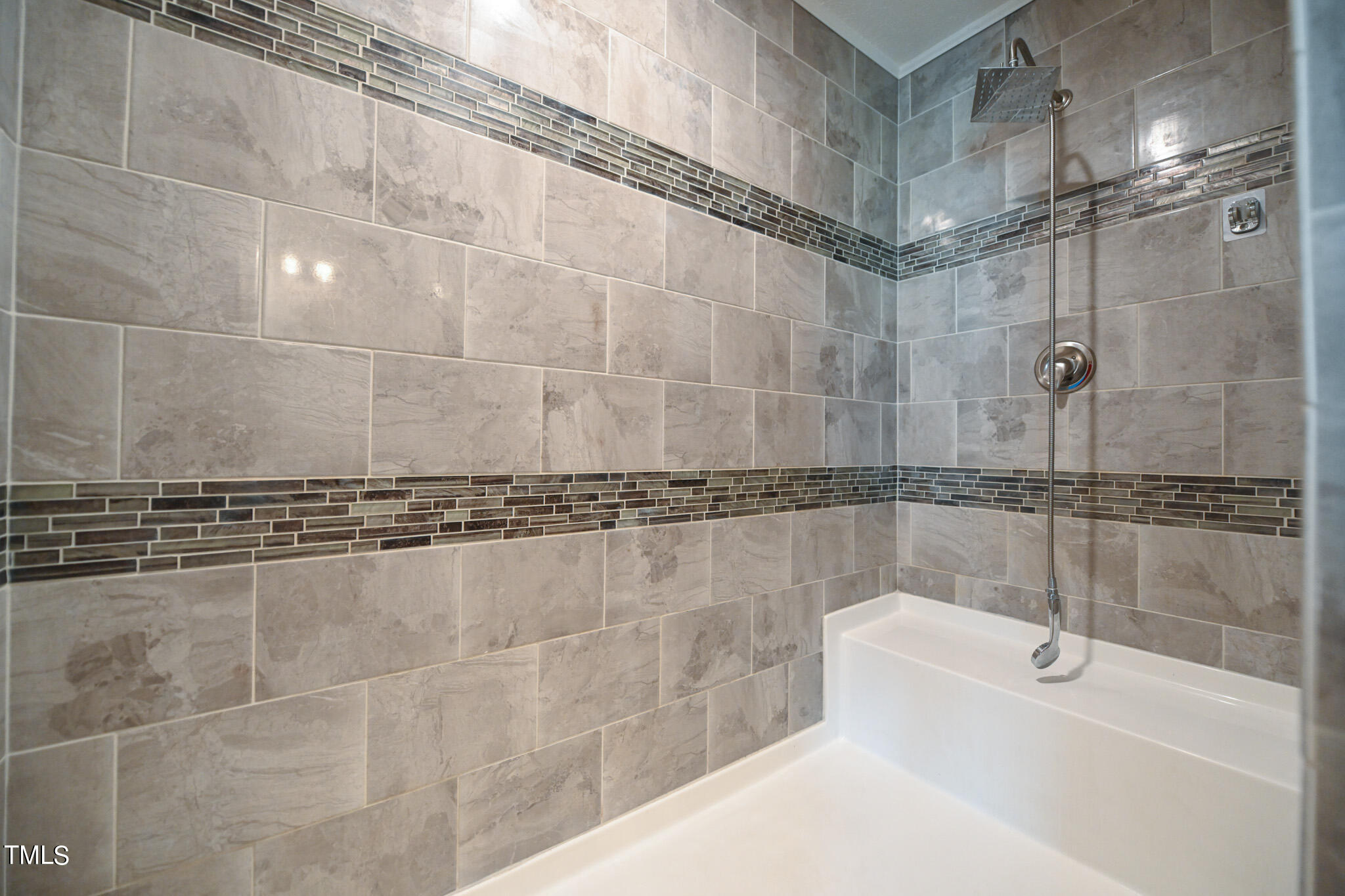 124 Evans Road Princeton, NC 27569 - Photo 25 of 44 a bathroom with a bathtub and shower