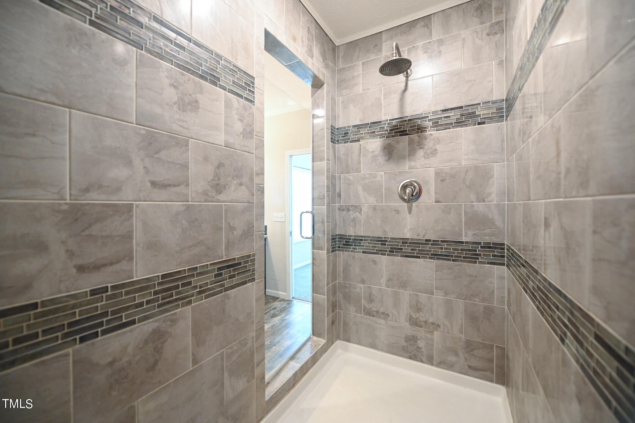 124 Evans Road Princeton, NC 27569 - Photo 26 of 44 a bathroom with a shower