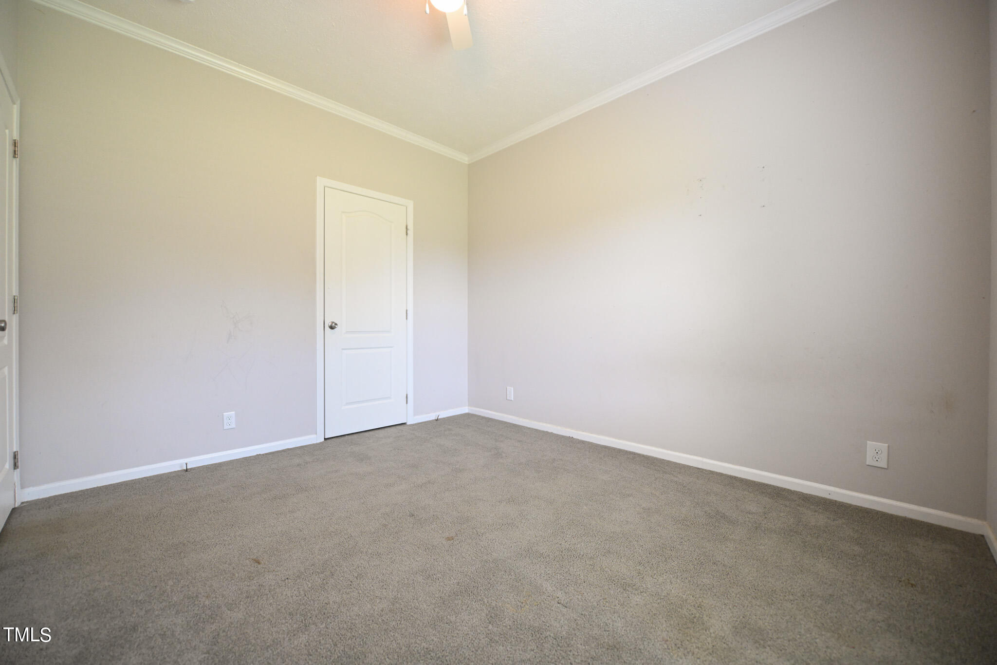 124 Evans Road Princeton, NC 27569 - Photo 29 of 44 an empty room with an entryway