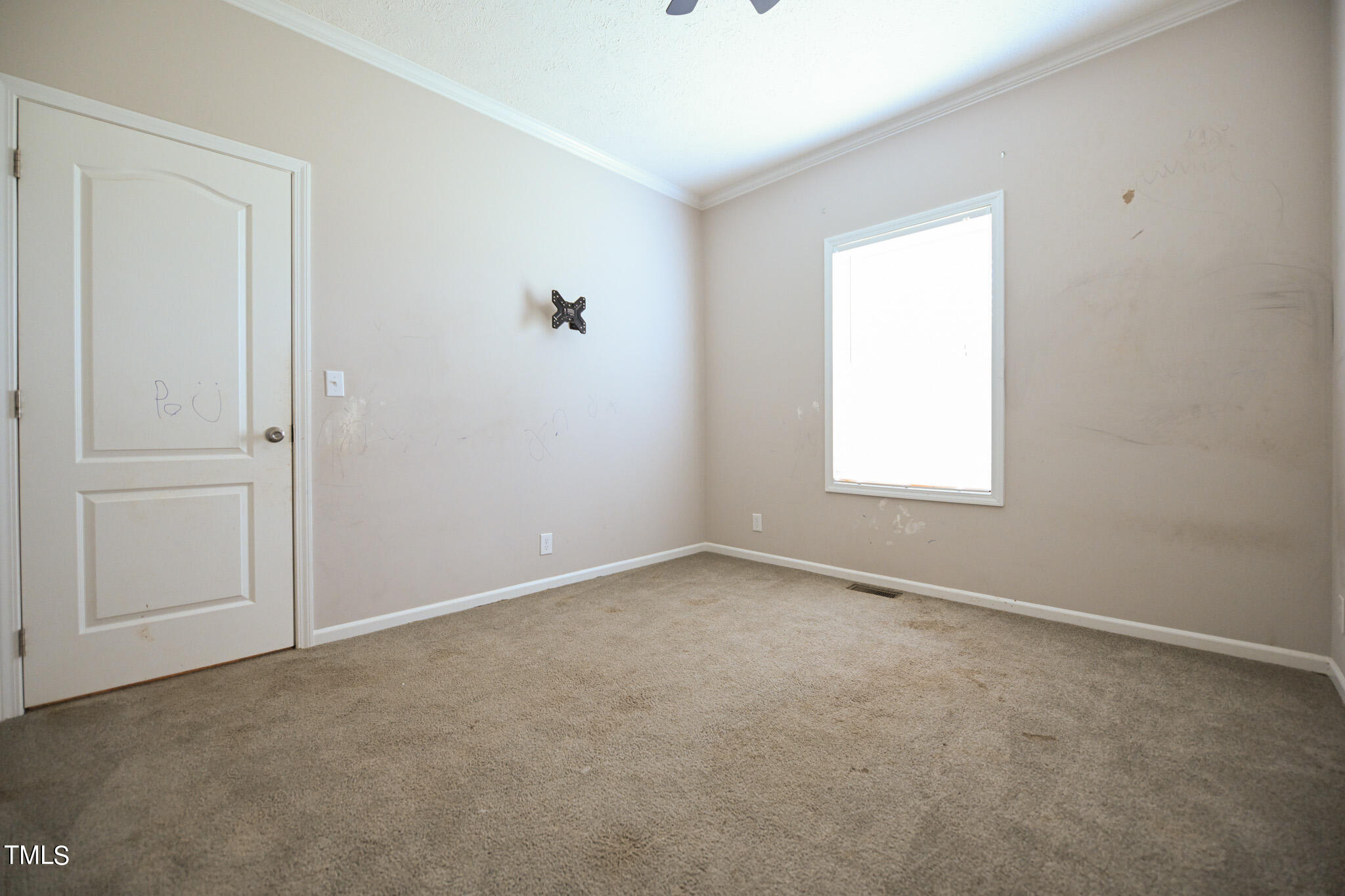 124 Evans Road Princeton, NC 27569 - Photo 32 of 44 an empty room with windows
