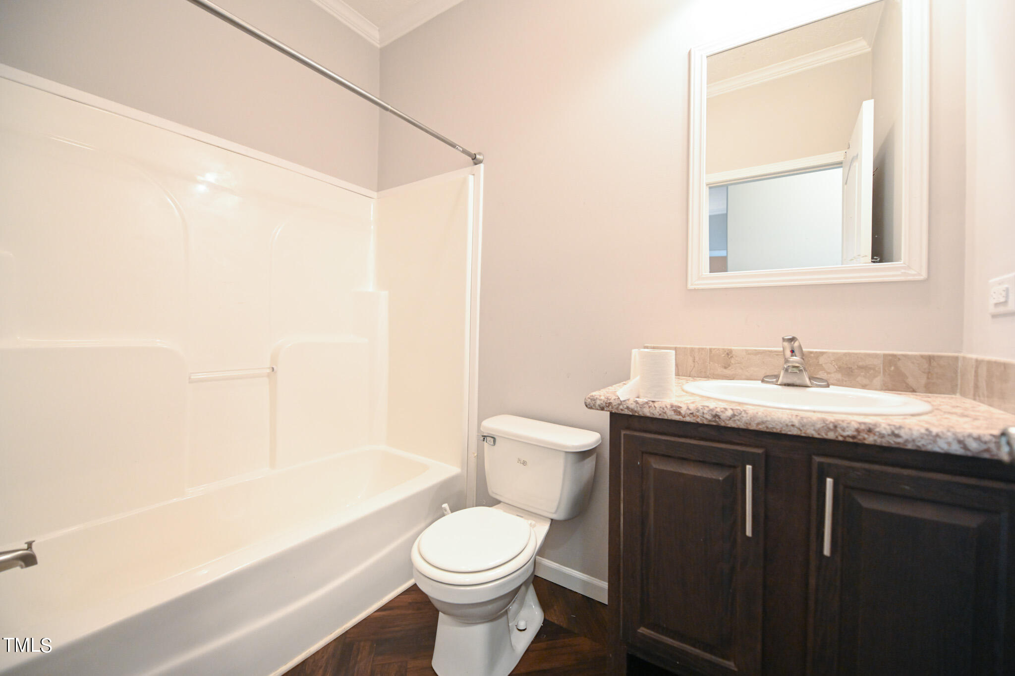 124 Evans Road Princeton, NC 27569 - Photo 33 of 44 a bathroom with a granite countertop sink toilet and shower