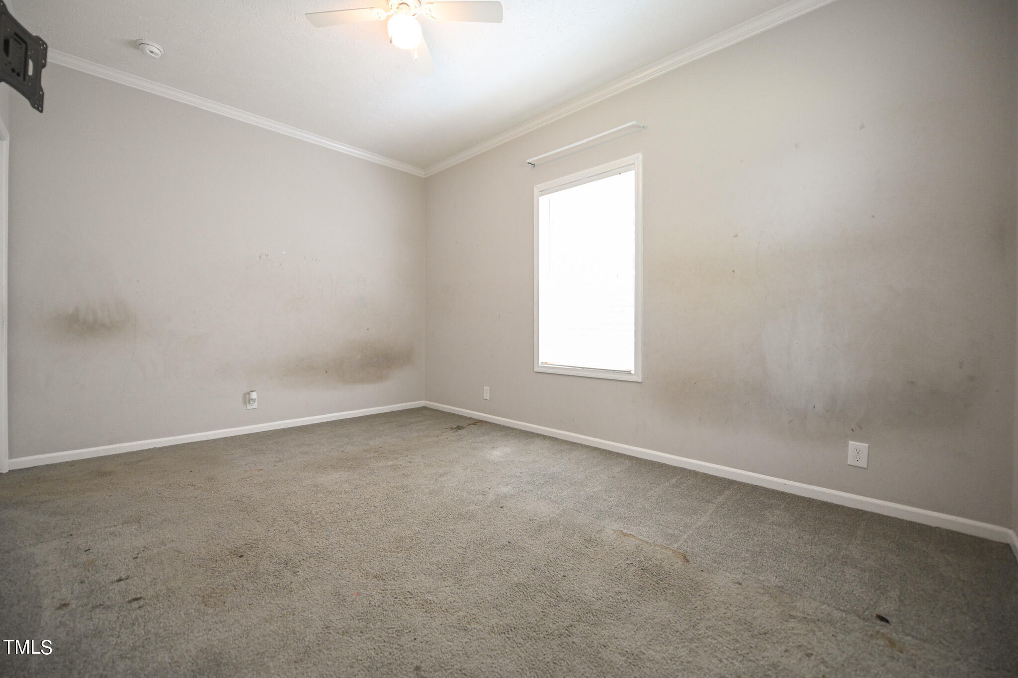 124 Evans Road Princeton, NC 27569 - Photo 36 of 44 an empty room with a window