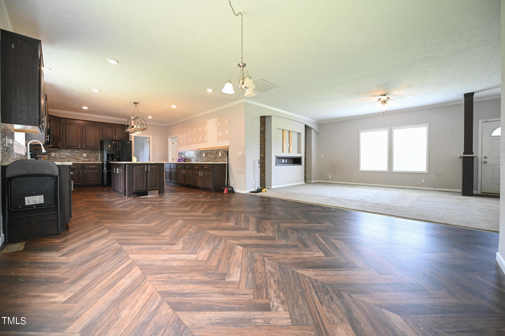 124 Evans Road Princeton, NC 27569 - Photo 10 of 44 a view of a kitchen with furniture and a kitchen