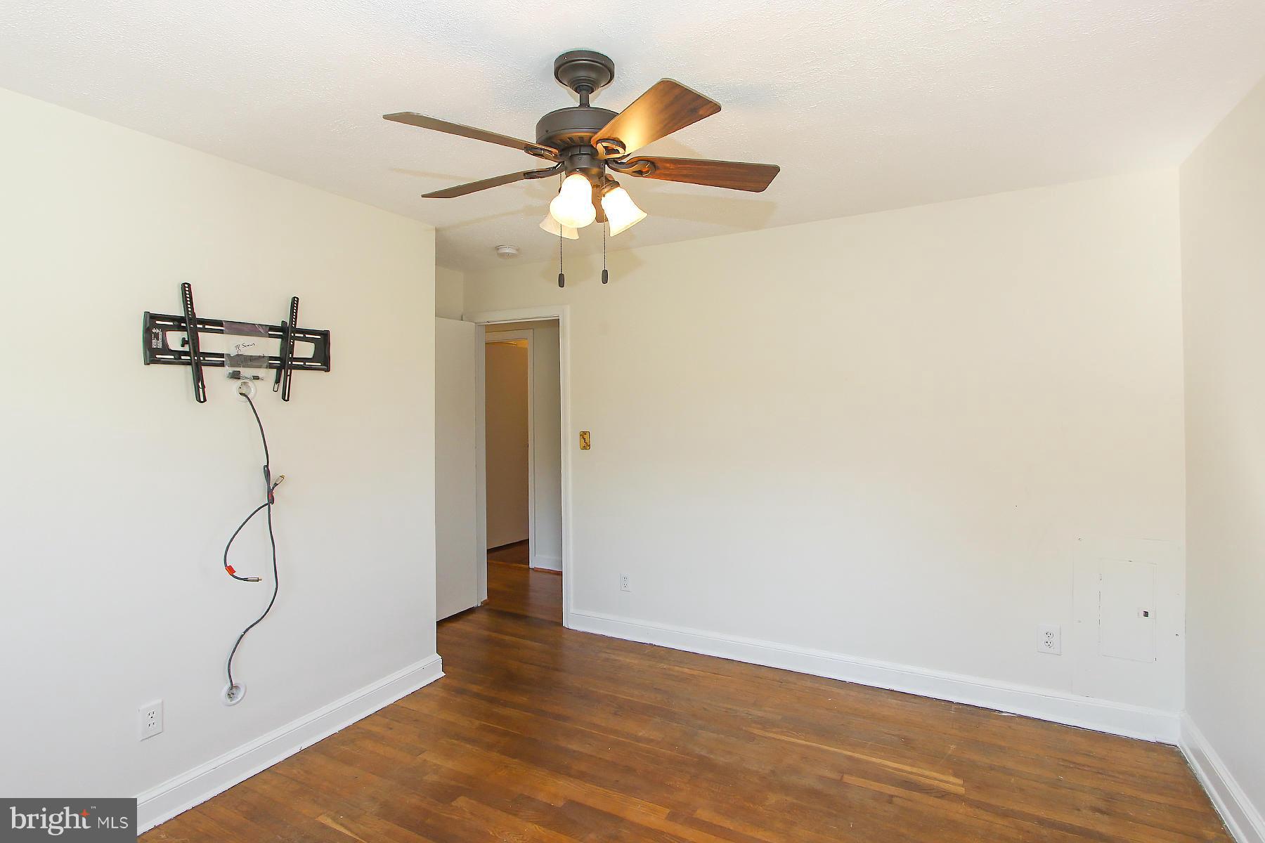 20820 Slidell Road Boyds, MD 20841 - Photo 17 of 29 a view of a room with wooden floor and white walls