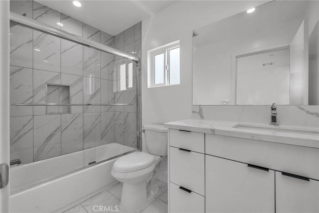 4453 Colfax Avenue, Unit 1 Studio City, CA 91602 - Photo 27 of 71 a bathroom with a sink a toilet and shower