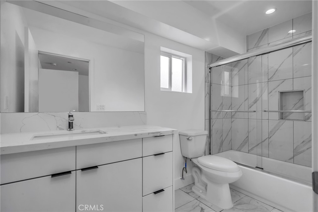 4453 Colfax Avenue, Unit 1 Studio City, CA 91602 - Photo 46 of 71 a bathroom with a sink toilet and shower