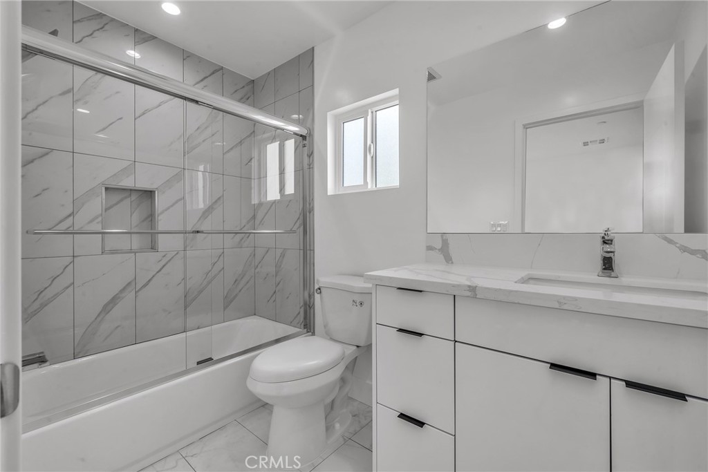 4453 Colfax Avenue, Unit 1 Studio City, CA 91602 - Photo 58 of 71 a bathroom with a sink a toilet and shower