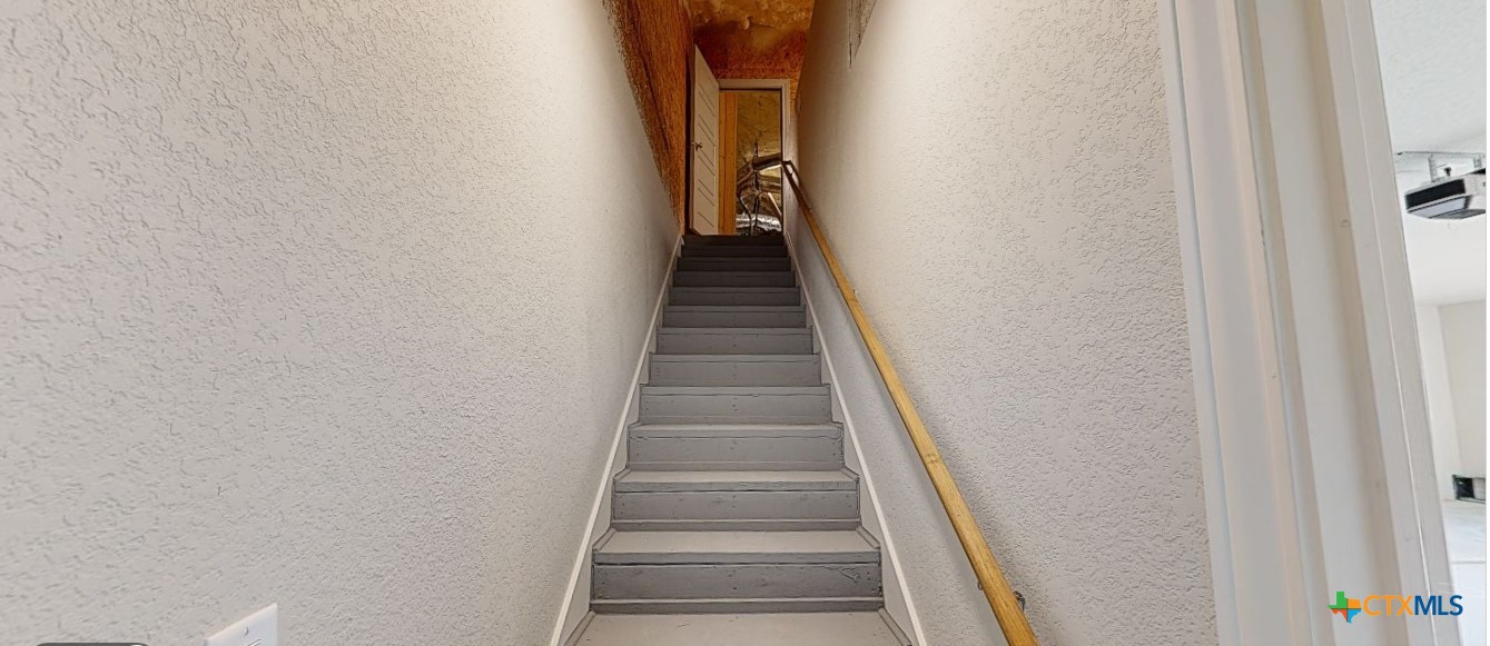 4249 Cold Springs Road Kempner, TX 76539 - Photo 40 of 48 Stairs leading to storage above garage