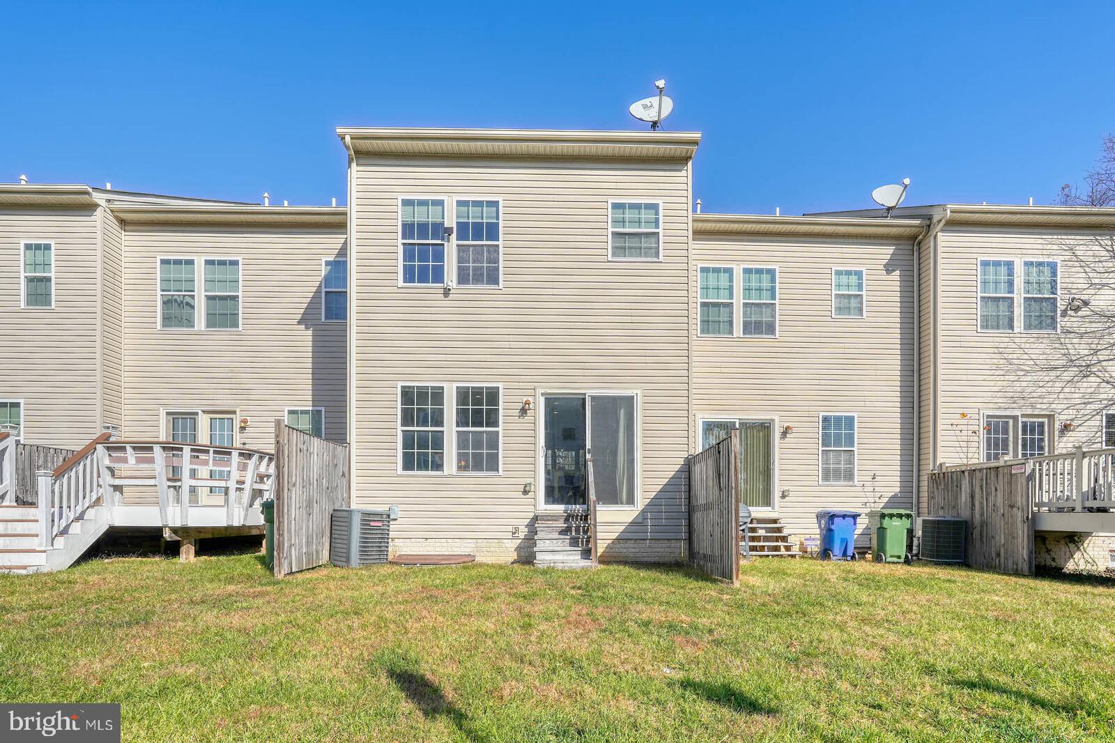 5183 Wyndholme Circle Baltimore, MD 21229 - Photo 29 of 31 a view of a house with a patio