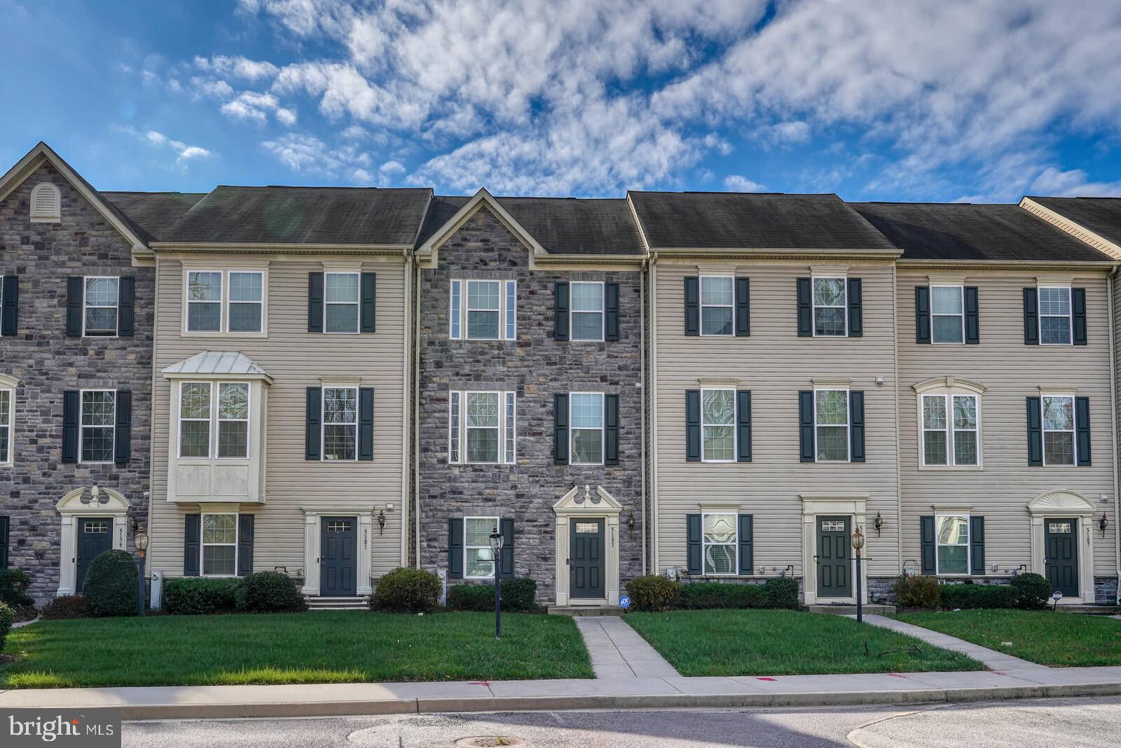 5183 Wyndholme Circle Baltimore, MD 21229 - Photo 31 of 31 a aerial view of a brick house next to a yard