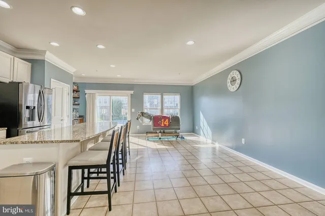a view of a chairs and table in a room